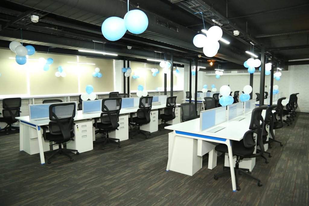 The large open-plan working space at MarketOne India''s new stylish office